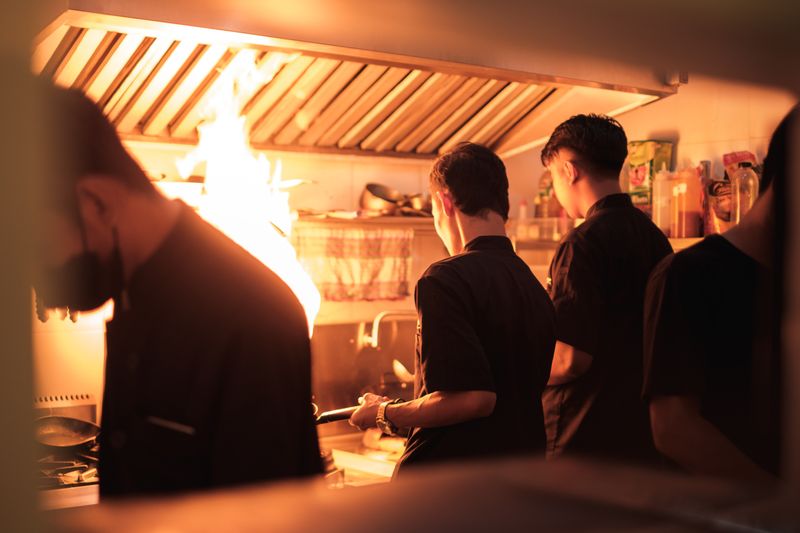 Marcos restaurant kitchen preparing fresh marco's pizza