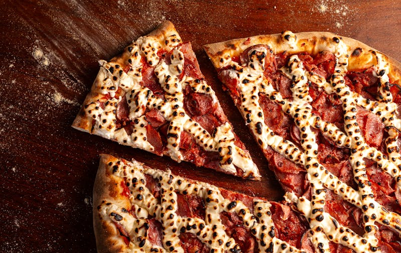 Marcos Pepperoni Supreme pizza loaded with toppings